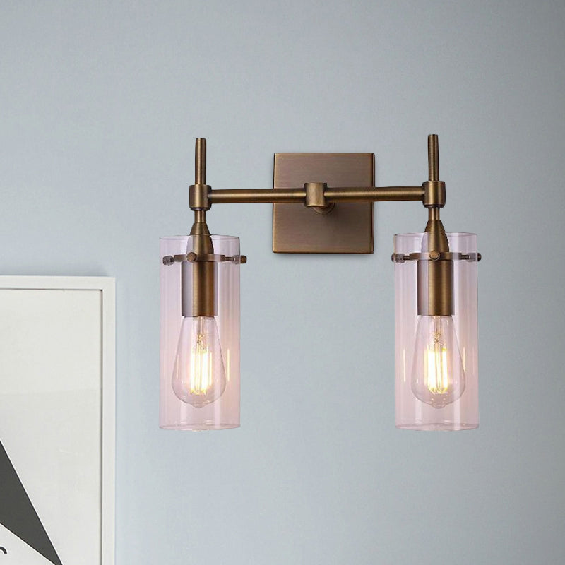Sikunuo | Clear Glass Cylinder Wall Lantern Modern 2 Lights Dining Room Lighting Fixture in Patina Brass