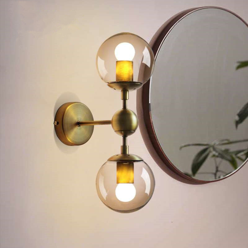 Sikunuo | 1/2-Head Global Wall Mount Light with Amber Glass Shade Modernist Wall Lamp Lighting in Gold for Bedroom