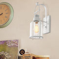 Sikunuo | Cylinder clear glass wall-mounted lamp industrial single bulb living room wall sconce in black/white/rust with cage