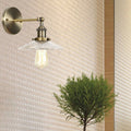 Sikunuo | A wall lamp with a conical shade made of clear prismatic glass Industrial dining room wall light lighting fixture