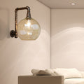 Sikunuo | Globe Stairway Wall Lamp Industrial Clear Glass 1 Light Aged Brass Wall Mounted Light with Corner Pipe, 8"/10" Width