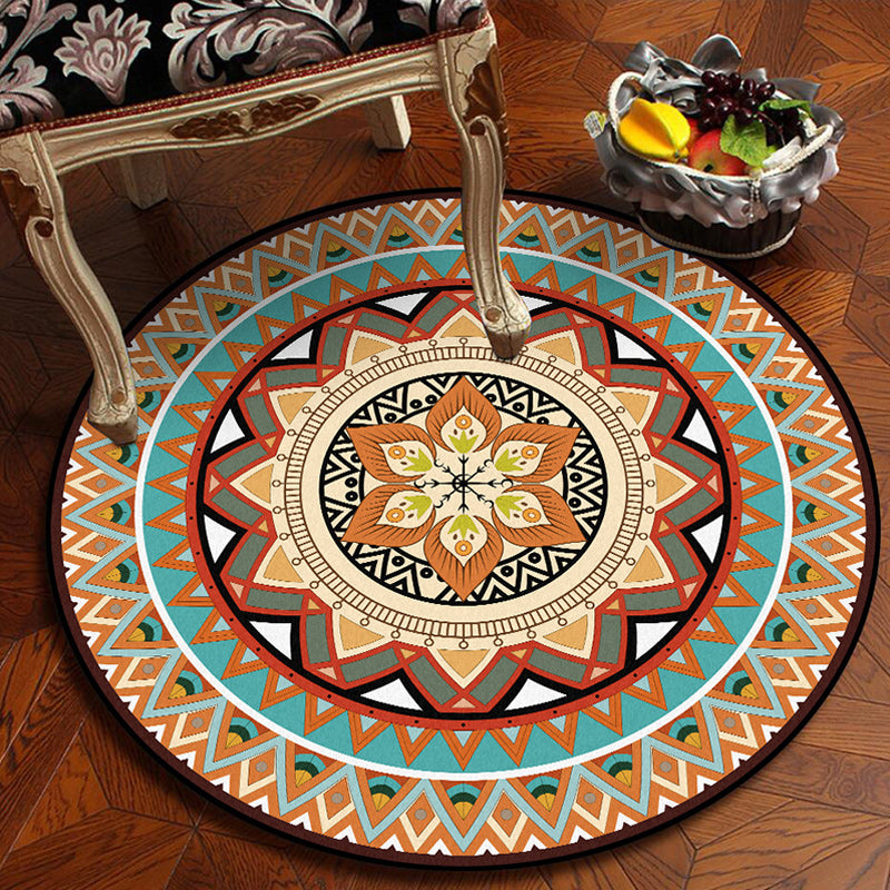 Sikunuo | Traditional concentric circle patterned rug with floral orange tribal rug made of polyester washable non-slip backing rug for the living room