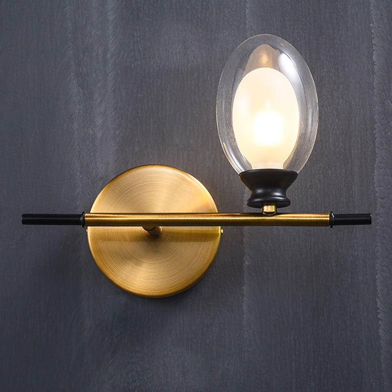 Sikunuo | Clear/Amber Glass Egg Shape Wall Light Minimalist 1 Light Brass Wall Lamp with Horizontal Arm