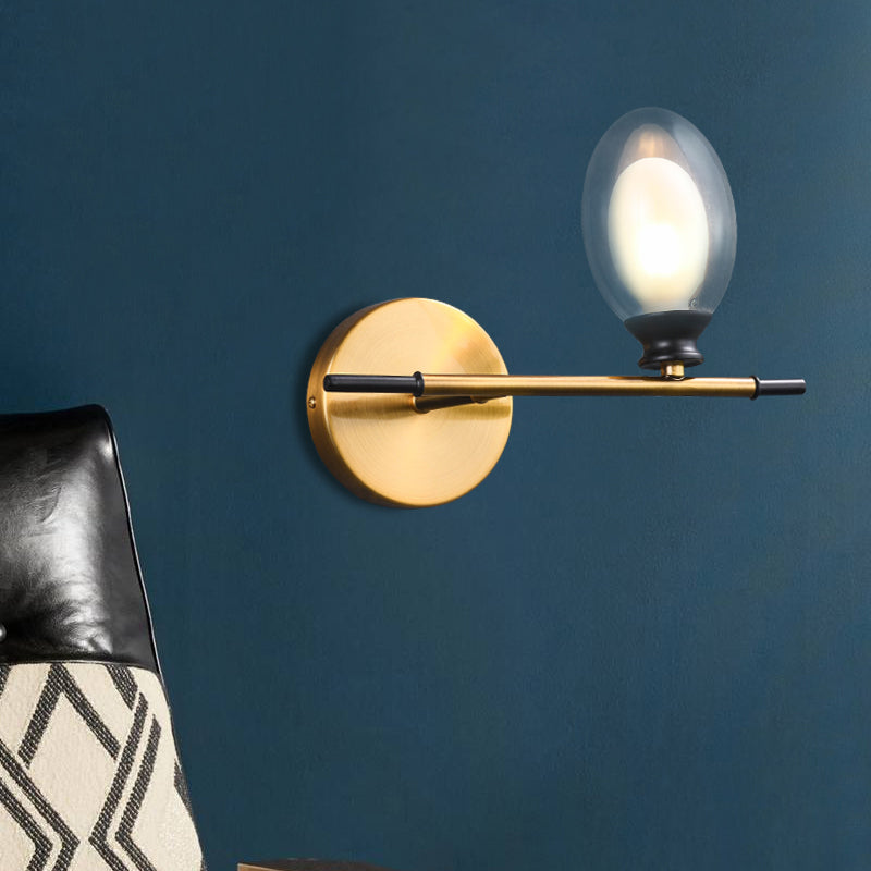 Sikunuo | Clear/Amber Glass Egg Shape Wall Light Minimalist 1 Light Brass Wall Lamp with Horizontal Arm