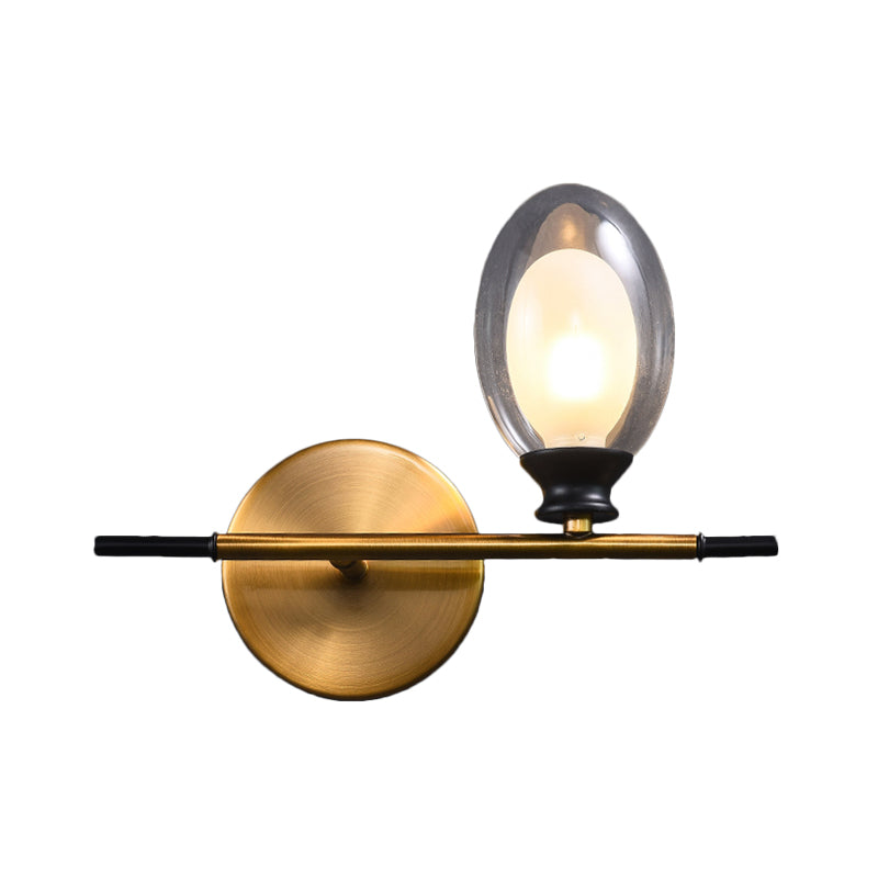 Sikunuo | Clear/Amber Glass Egg Shape Wall Light Minimalist 1 Light Brass Wall Lamp with Horizontal Arm