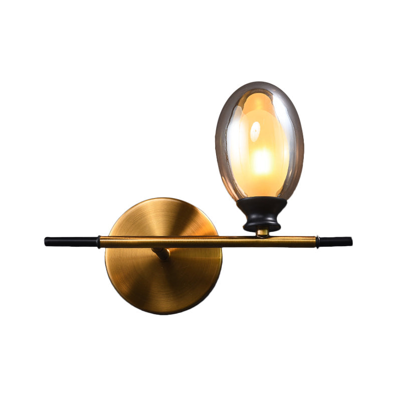 Sikunuo | Clear/Amber Glass Egg Shape Wall Light Minimalist 1 Light Brass Wall Lamp with Horizontal Arm