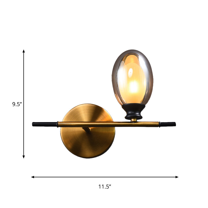 Sikunuo | Clear/Amber Glass Egg Shape Wall Light Minimalist 1 Light Brass Wall Lamp with Horizontal Arm