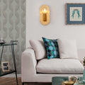 Sikunuo | 1 Head Exposed Bulb Wall Mount Lamp with Oval Metal Back Plate Postmodern Wall Lighting in Gold