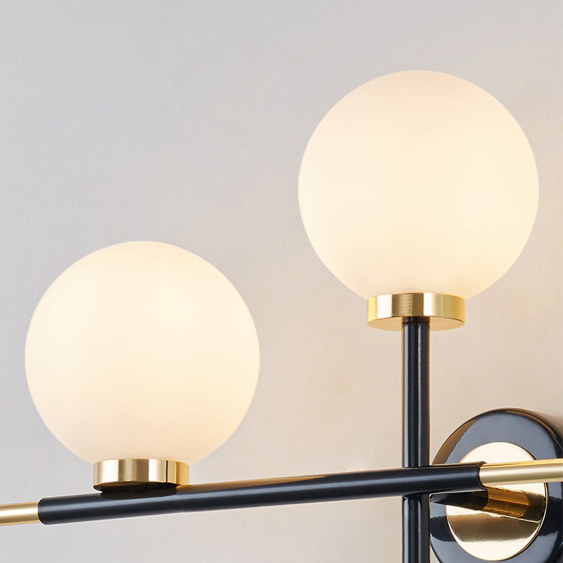 Sikunuo | Milk glass orb wall light with cross design 2 lights modern black and brass wall light