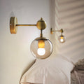 Sikunuo | 1/2-Head Global Wall Mount Light with Amber Glass Shade Modernist Wall Lamp Lighting in Gold for Bedroom