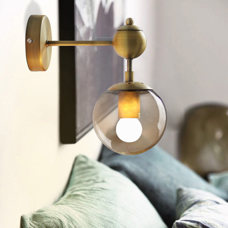 Sikunuo | 1/2-Head Global Wall Mount Light with Amber Glass Shade Modernist Wall Lamp Lighting in Gold for Bedroom