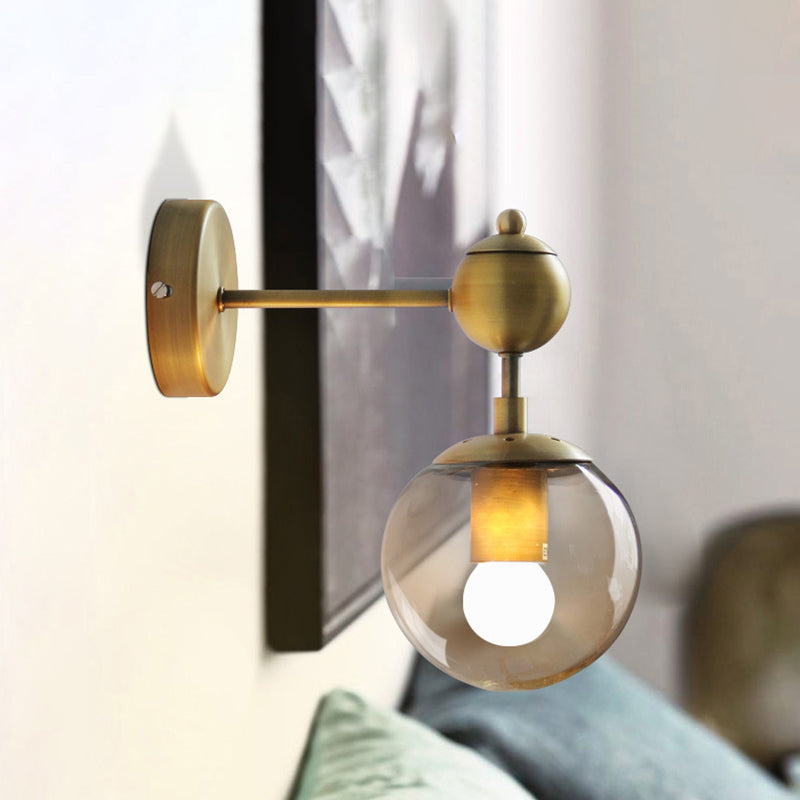 Sikunuo | 1/2-Head Global Wall Mount Light with Amber Glass Shade Modernist Wall Lamp Lighting in Gold for Bedroom