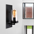 Sikunuo | A wall lamp with a capsule shade made of clear glass, industrial living room wall lighting in black