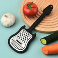 Sikunuo | Vegetable peeler made of stainless steel – Guitar-shaped peeler for peeling & slicing