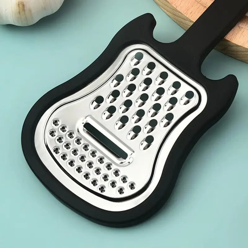 Sikunuo | Vegetable peeler made of stainless steel – Guitar-shaped peeler for peeling & slicing