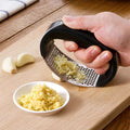Sikunuo | Durable garlic press made of stainless steel for effortless crushing