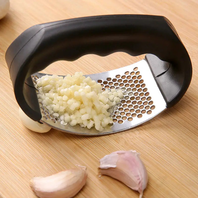 Sikunuo | Durable garlic press made of stainless steel for effortless crushing