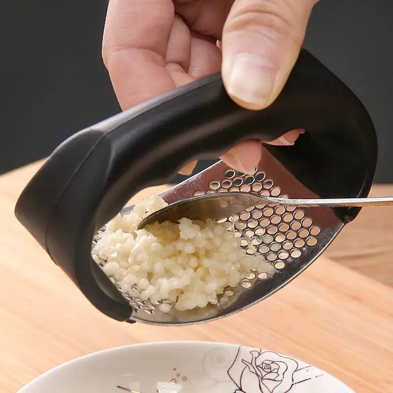 Sikunuo | Durable garlic press made of stainless steel for effortless crushing