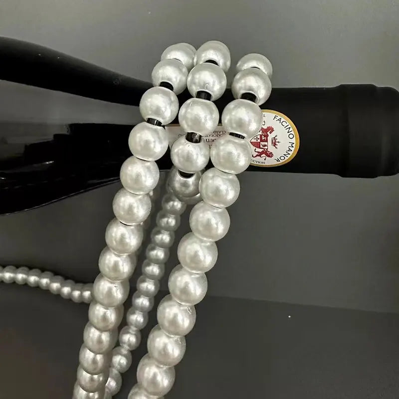 Sikunuo | Floating Pearl Wine Display Stand