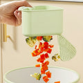 Sikunuo | Corner drain basket with suction cup – With floor flap for touch-free disposal