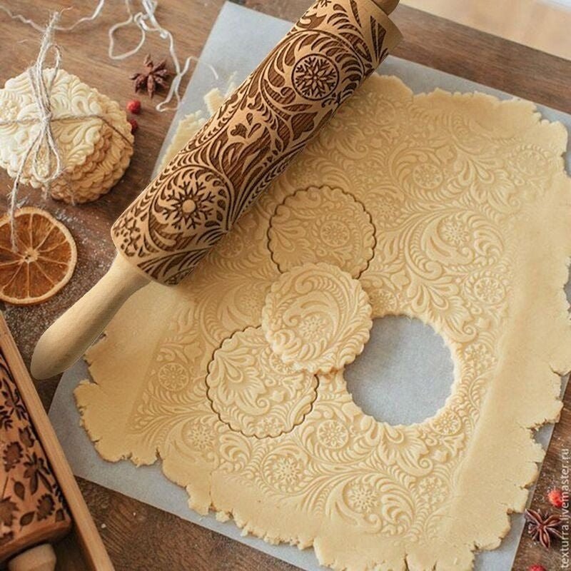 Handmade rolling pin with decorative Christmas embossing