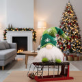 Luminous Christmas doll with warm, yellow glow for festive decoration