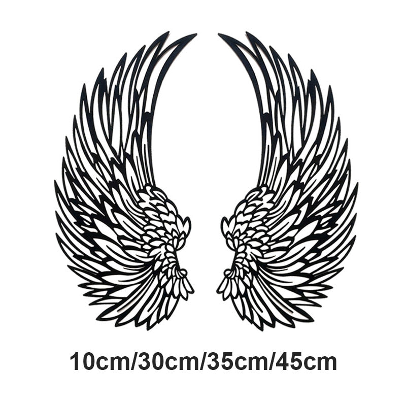 Metal wall art with angel wings and LED lights