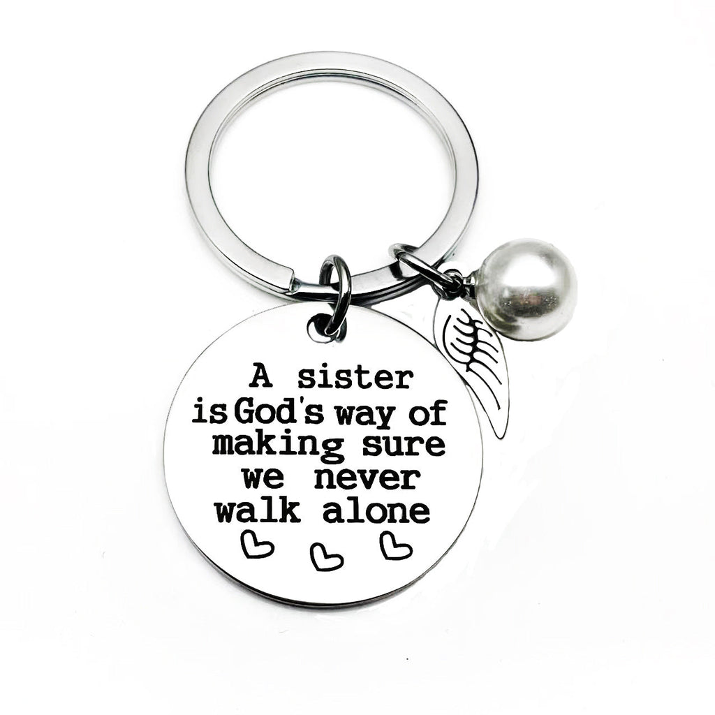 A sister is God's way of making sure we never walk alone keychain