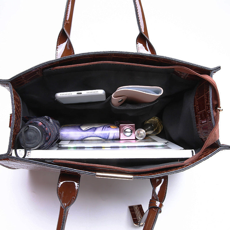 Bag with crocodile embossing.