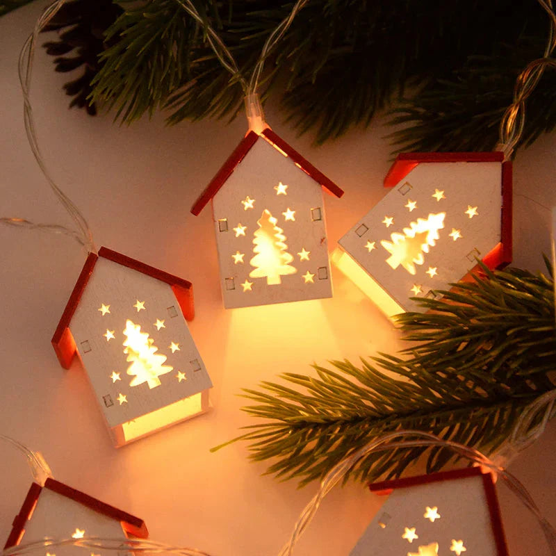 Wooden Christmas houses with LED lighting for festive decoration