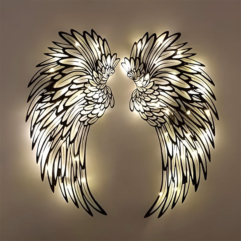 Metal wall art with angel wings and LED lights