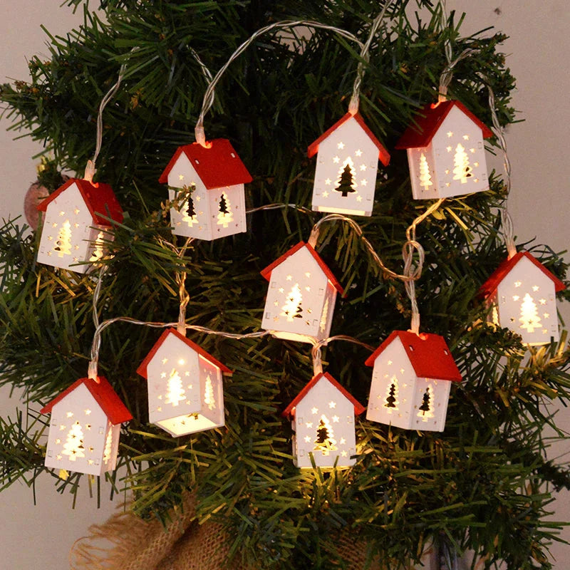 Wooden Christmas houses with LED lighting for festive decoration